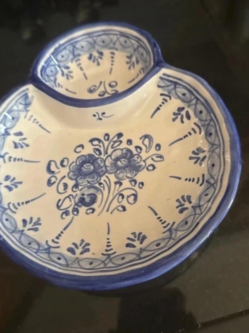 This an antique blue and white ceramic inkwell in the Moustiers style.  Portugal